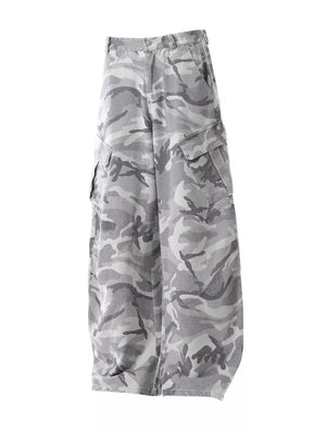 Baggy white camouflage cargo pants with multiple pockets and button fly.