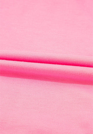Pink track pants with a soft fabric texture