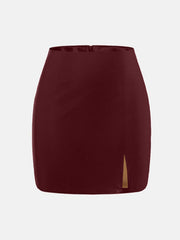 Burgundy leatherette mini skirt with a side slit and high waist.