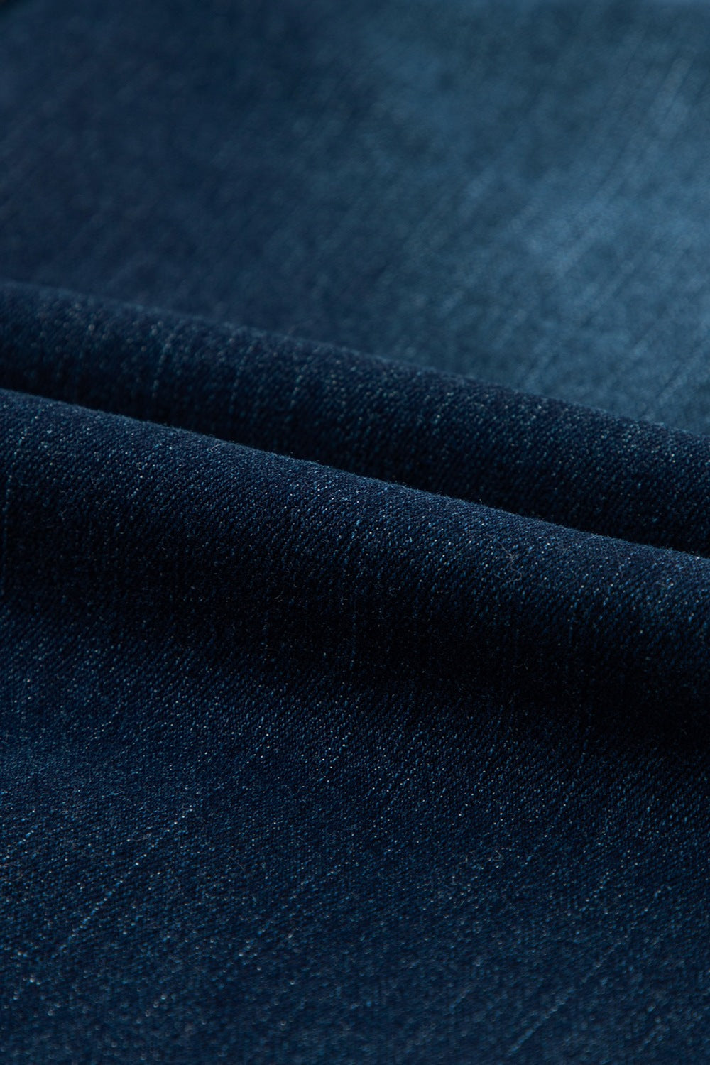 Dark wash denim widecut jeans fabric detail