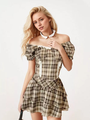 Plaid puff sleeve two-piece set with lace trim and ruffled skirt.