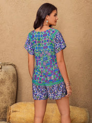 Floral tie-front romper with V-neck and short sleeves in bohemian print