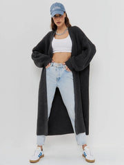 Oversized charcoal gray ribbed knit maxi cardigan with open front and balloon sleeves.