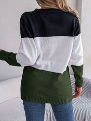 Colorblock cable knit cardigan in acrylic with black, white, and army green stripes.