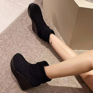 Black polka dot suede wedge boots with platform sole
