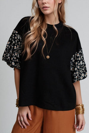 Black t-shirt with daisy print contrast sleeves and crew neck