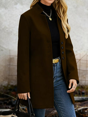 Chic longline trench coat in chocolate with button-down front and collarless neckline.
