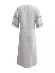 Maxi dress with V-neck, short sleeves, and blue stripe detail on sleeves.