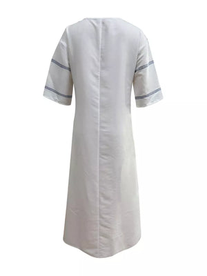 Maxi dress with V-neck, short sleeves, and blue stripe detail on sleeves.