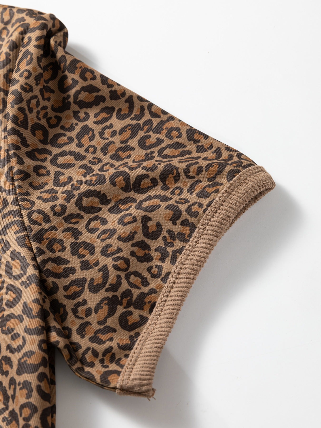 Leopard print t-shirt with ribbed cuff detail.