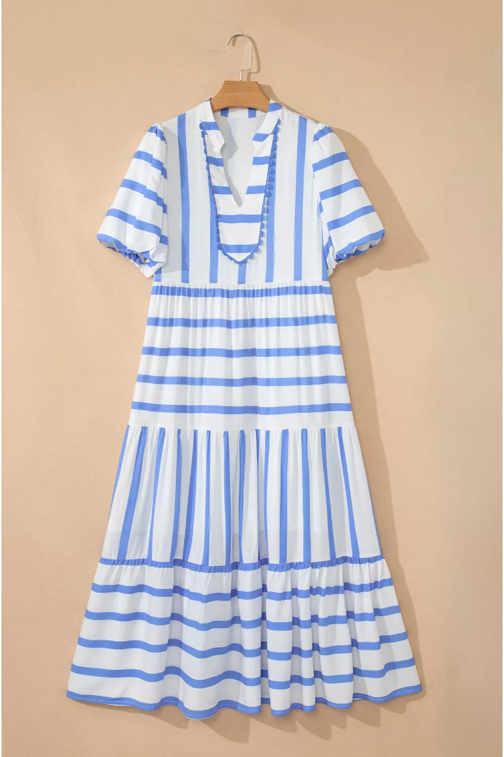 Tiered maxi dress with blue and white stripes, V-neck, short sleeves, and ricrac trim.