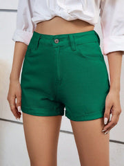 Dark green denim high-waist shorts with cuffed hems and a button closure.