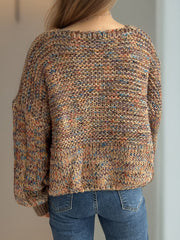 Textured knit sweater with balloon sleeves in a multicolor yarn.