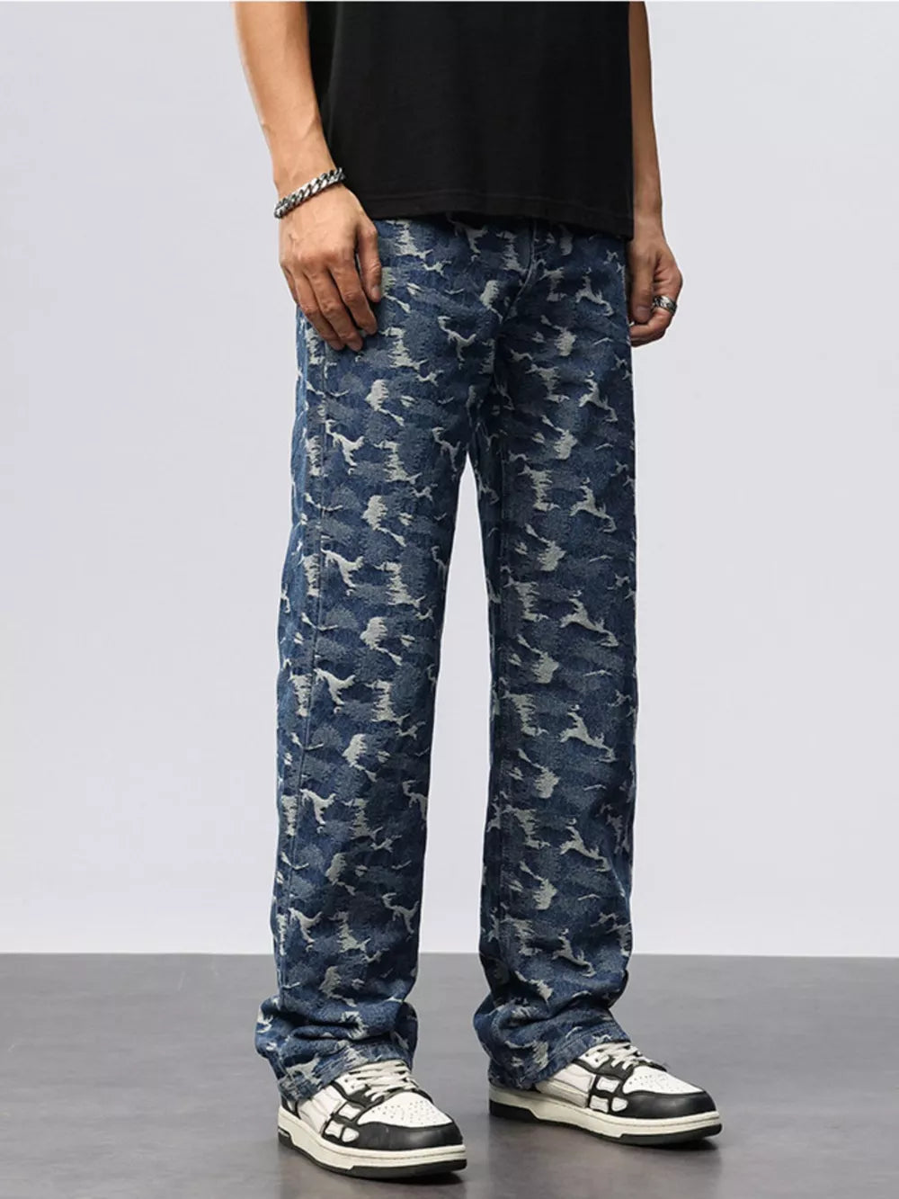Relaxed fit blue cotton jeans with abstract camouflage pattern