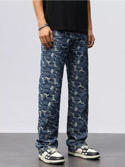 Relaxed fit blue cotton jeans with abstract camouflage pattern