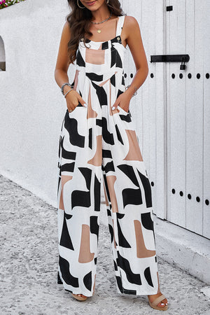 Abstract print wide leg jumpsuit with pockets and square neckline.