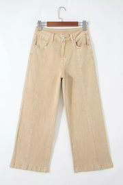 High-waisted cropped wide-leg jeans in tan denim with front seam detail.