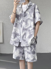 Men's casual camouflage shirt and shorts set in dark gray with a textured pattern.