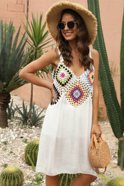 White crochet yoke cover-up dress with colorful granny squares and V-neck.