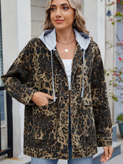 Leopard print denim jacket with a removable grey hooded lining and utility pockets.