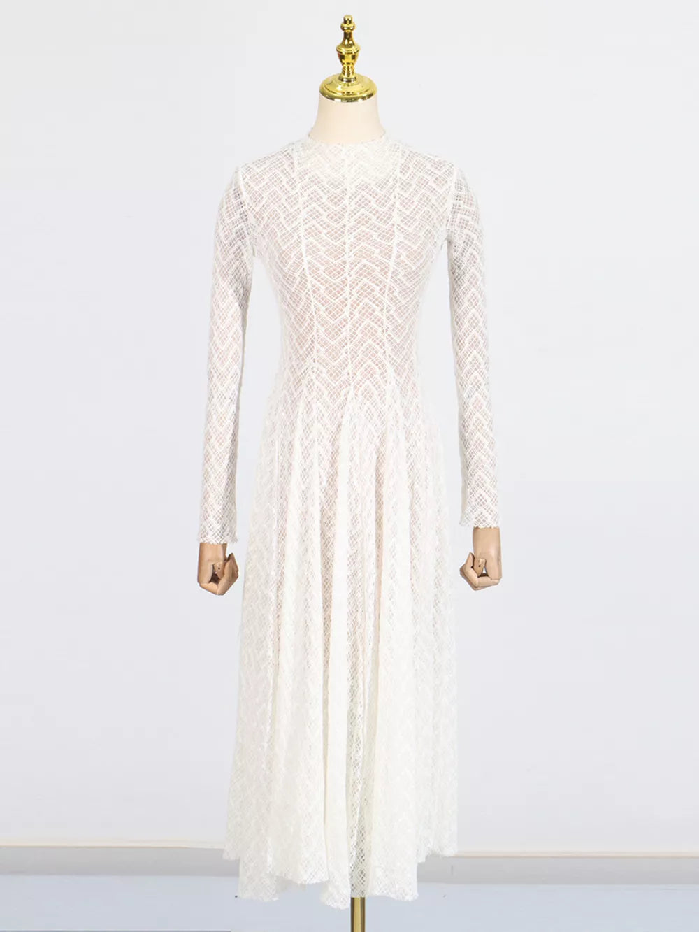 White lace maxi dress with mock neck and long sleeves, chevron pattern