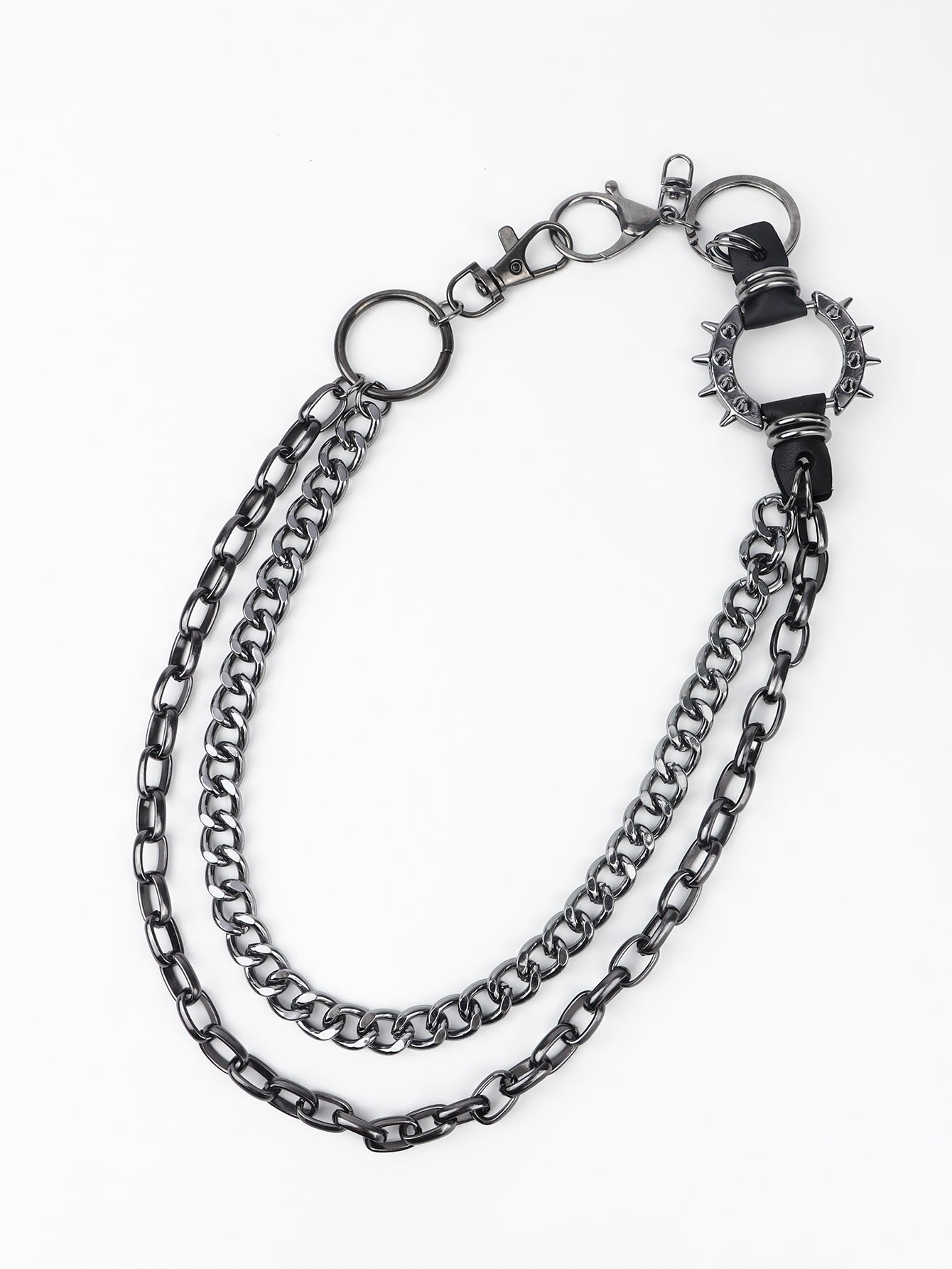 Black spiked chain harness belt with aluminum hardware and multiple clasps.