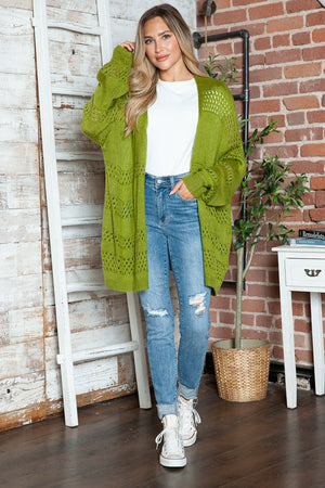 Open-knit slouchy cardigan in matcha green with a relaxed fit and long sleeves.