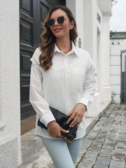 White cable knit V-neck sleeveless sweater over a white collared shirt.