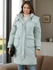 Sage diamond quilted hooded puffer coat with snap flap pockets and zip front.