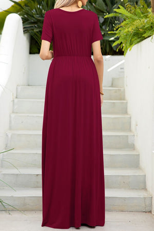 Wine gathered waist maxi dress with short sleeves and pockets, flowing skirt.
