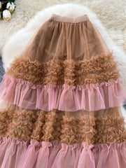 Tiered ruffle tulle skirt in brown and pink with a full cut.