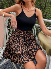 Leopard print ruffle hem mini skirt with a black cami top.