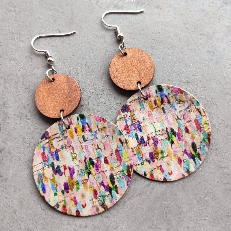 Cork & wood stripe disc earrings with colorful abstract pattern.