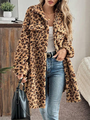 Leopard print shaggy button-down duster coat with pockets and a relaxed fit.