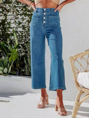 Button-front wide-leg cropped jeans in light blue denim with patch pockets.