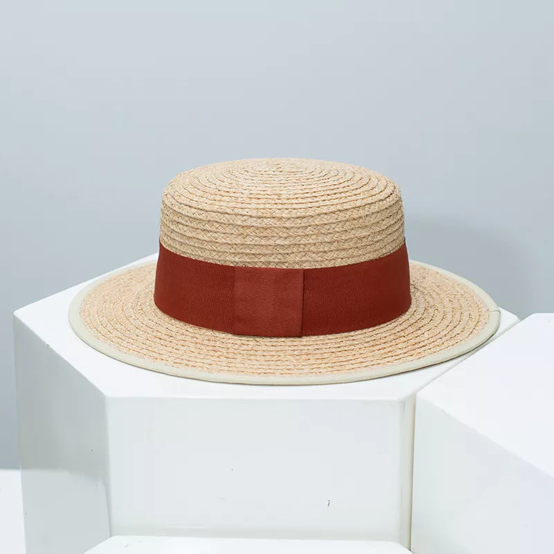 Classic straw boater hat with elegant burgundy band