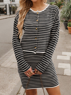 Black and white striped knit co-ord set with buttoned cardigan and fitted skirt.