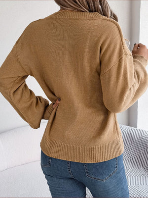 Cable knit button-front cardigan in khaki acrylic with ribbed hem and cuffs.