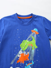 Blue cotton t-shirt with dinosaur and UFO graphic, crew neck, short sleeves.