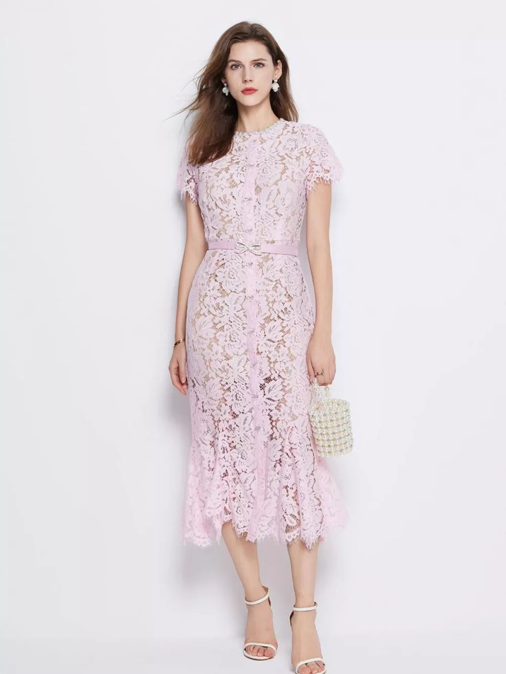 Powder floral lace mermaid dress with short sleeves and a belt.