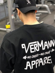 Black oversized graphic tee with Vermann Apparel logo and text print on back.