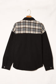 Black denim trucker jacket with plaid panel on shoulders and back.