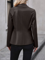 Double-breasted faux leather blazer in chocolate brown with a classic collar and buttoned front.