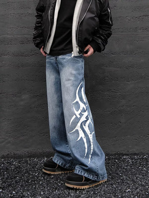 Men's blue denim wide leg jeans with tribal print detail