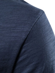 Textured slub cotton crewneck tee in navy showing fabric detail.