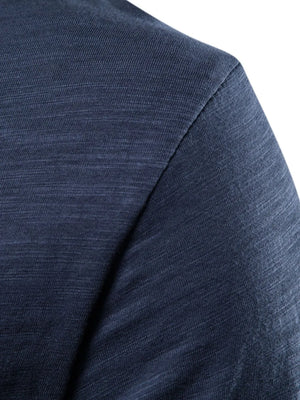Textured slub cotton crewneck tee in navy showing fabric detail.