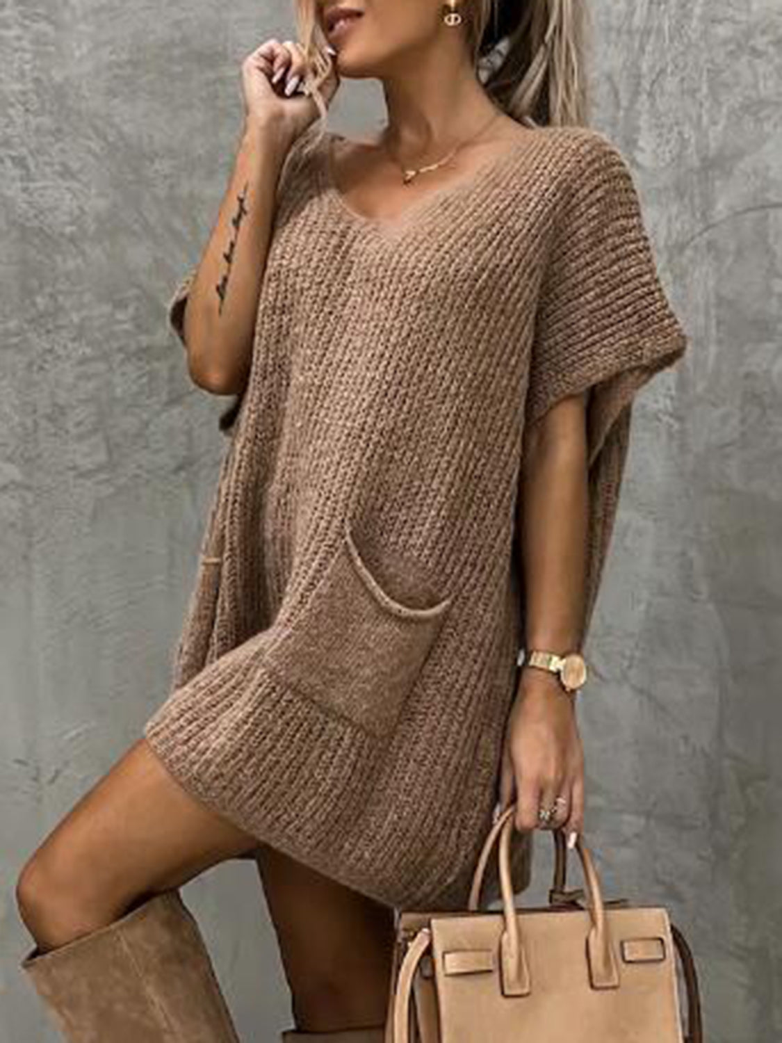 Mocha knit cocoon dress with v-neck, short sleeves, and patch pockets.