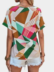 Geometric print V-neck blouse with short sleeves in multicolor.