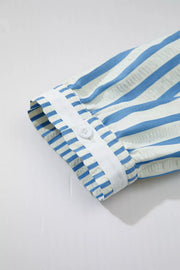 Classic striped collared blouse with button cuff detail in blue and white cotton.