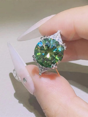 Emerald Prism Silver Ring with large green stone and accent stones.